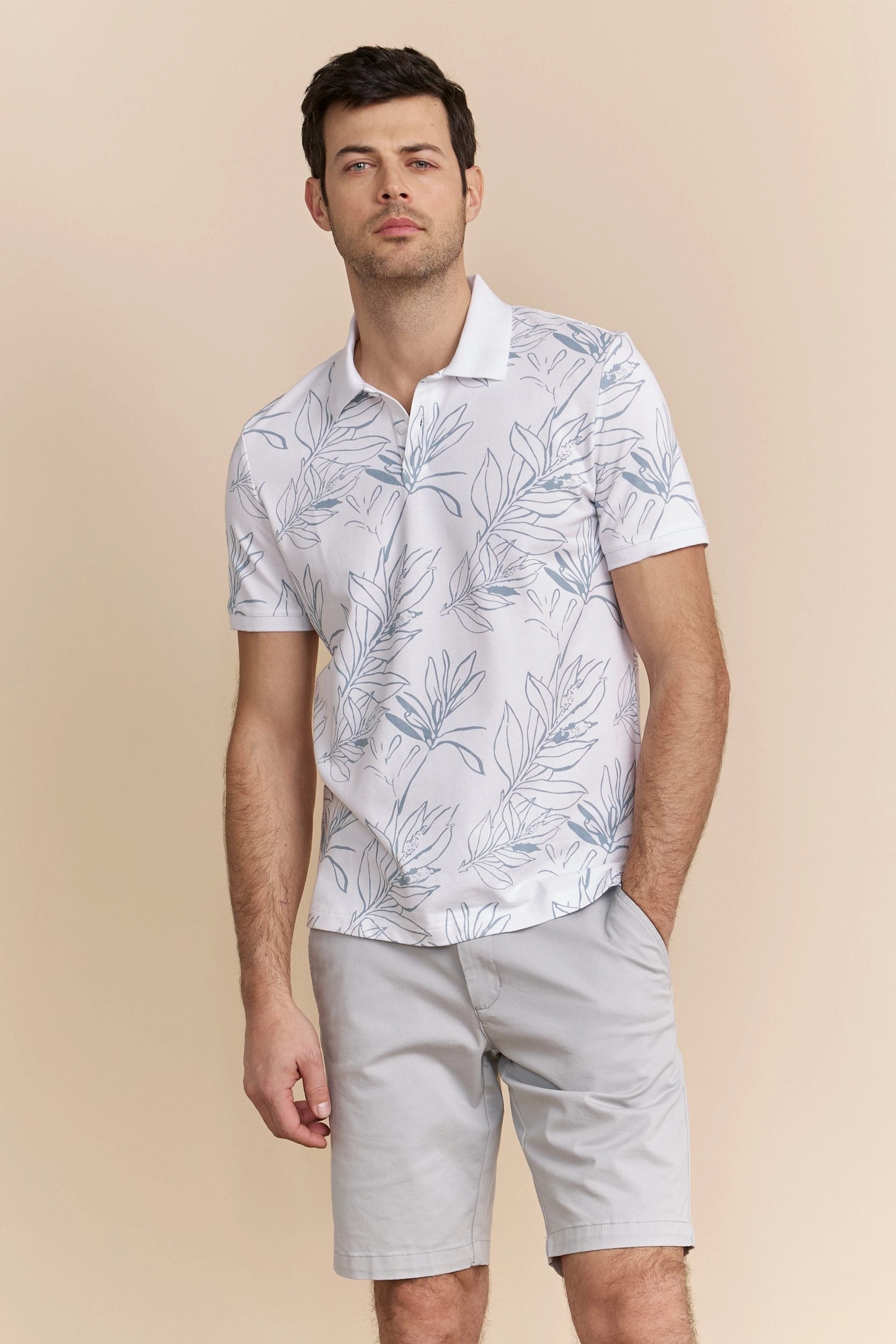 Breathable mesh NonChafing Seam Placement Foliage print polo