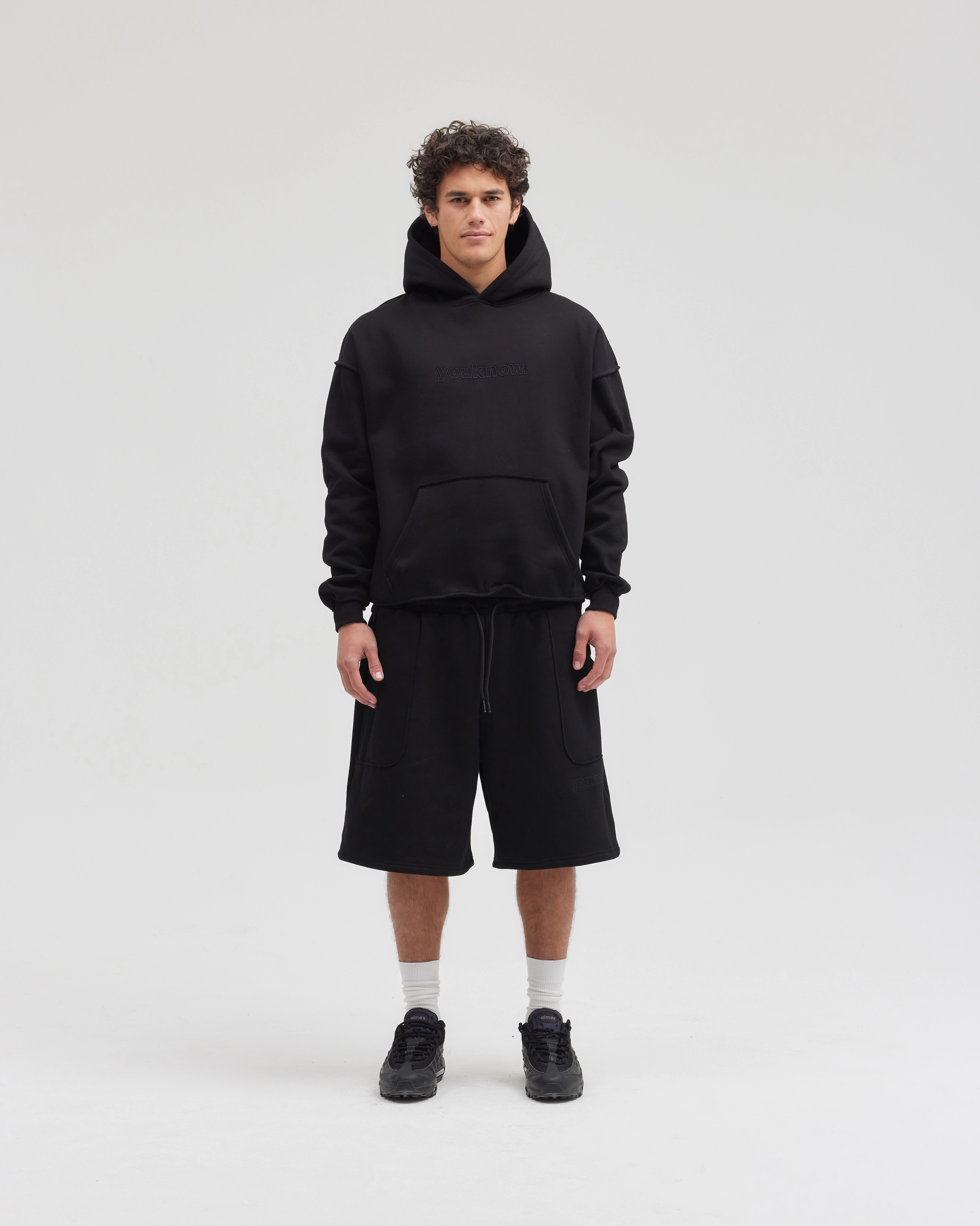 Surfing wear Colorblock Panel Design Exposed Seam Hoodie | Black